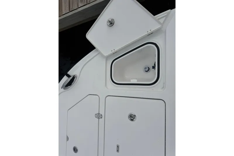 Your Next Boat! Yacht Photos Pics 2026 Blackfin 262 HB boat storage compartments and hatch detail.