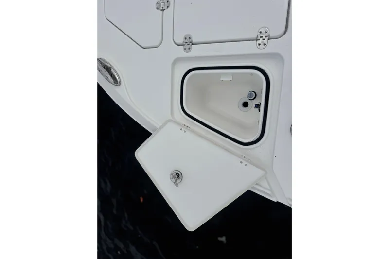 Your Next Boat! Yacht Photos Pics Open storage compartment on 2026 Blackfin 262 HB boat deck.
