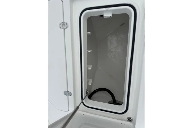 Your Next Boat! Yacht Photos Pics Open storage compartment on 2026 Blackfin 262 HB boat, featuring a clean interior.