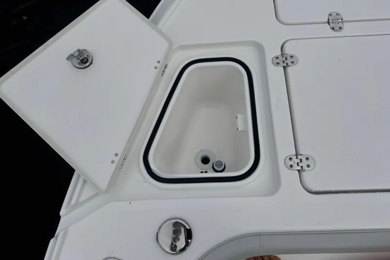 Your Next Boat! Yacht Photos Pics Open storage compartment on 2026 Blackfin 262 HB boat deck.