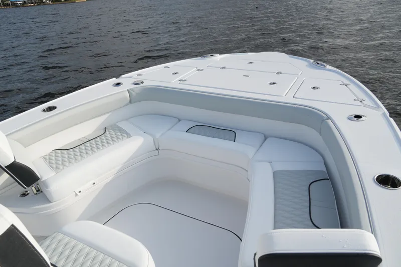 Your Next Boat! Yacht Photos Pics Luxurious seating on 2026 Blackfin 262 HB boat, overlooking serene water.
