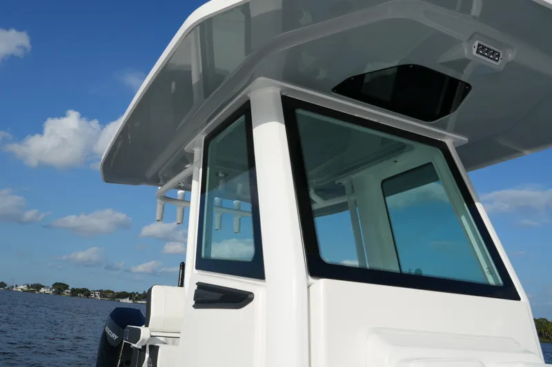 Your Next Boat! Yacht Photos Pics 2026 Blackfin 262 HB boat with sleek design on a sunny day.