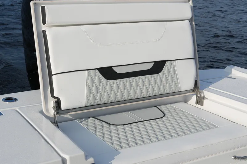 Your Next Boat! Yacht Photos Pics 2026 Blackfin 262 HB boat seat with diamond-patterned upholstery on open water.
