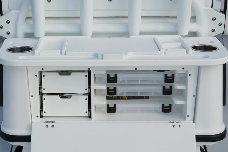 Your Next Boat! Yacht Photos Pics 2026 Blackfin 262 HB boat storage compartments with tackle boxes and cup holders.