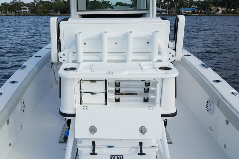 Your Next Boat! Yacht Photos Pics 2026 Blackfin 262 HB boat interior with fishing rod holders and storage compartments.