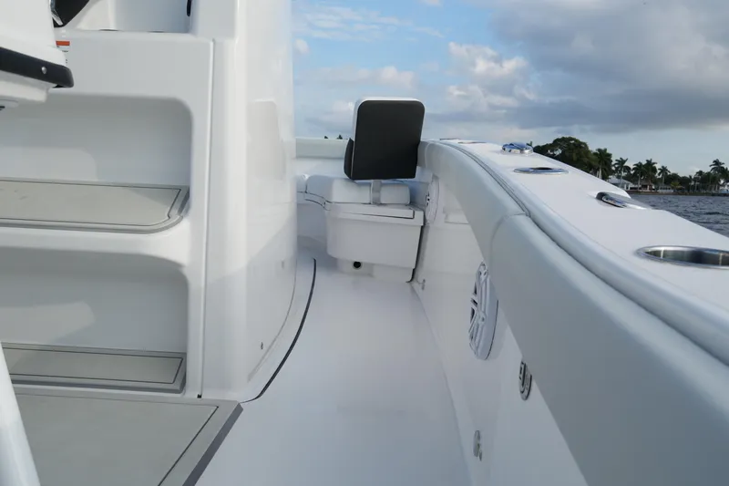 Your Next Boat! Yacht Photos Pics 2026 Blackfin 262 HB boat interior with sleek white design and seating.