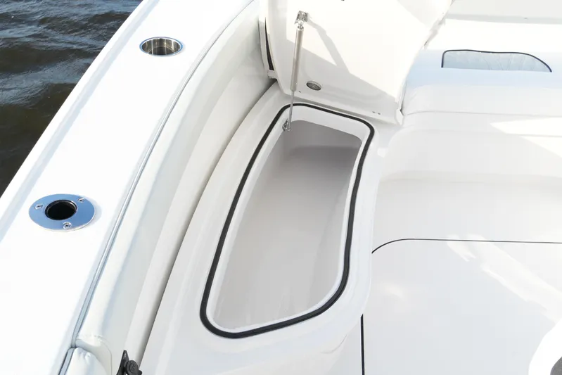 Your Next Boat! Yacht Photos Pics 2026 Blackfin 262 HB boat storage compartment with open lid, showcasing sleek design.