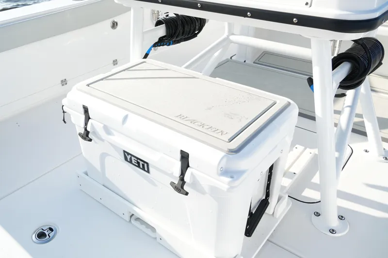 Your Next Boat! Yacht Photos Pics 2026 Blackfin 262 HB boat deck with Yeti cooler and storage area.