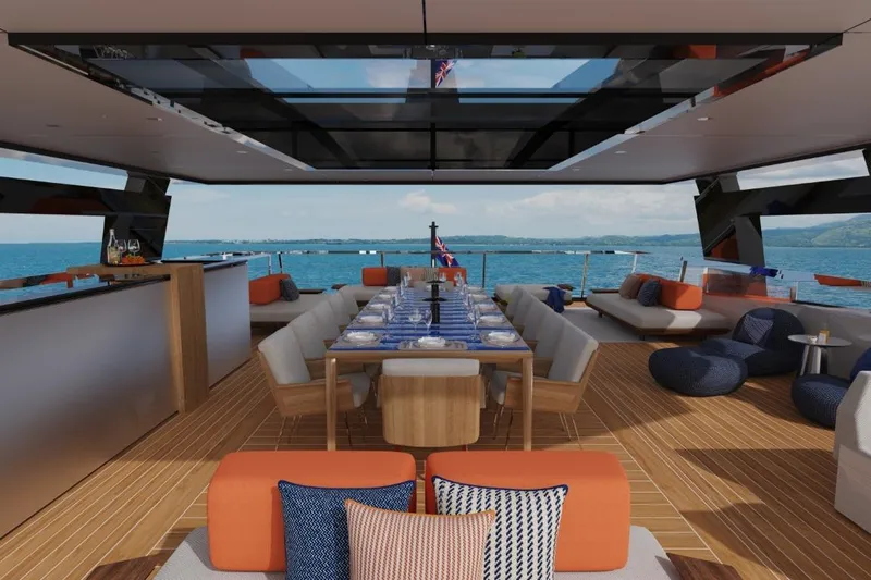  Yacht Photos Pics Luxurious 2026 Silver Yachts SC22M interior with elegant dining setup and ocean view.