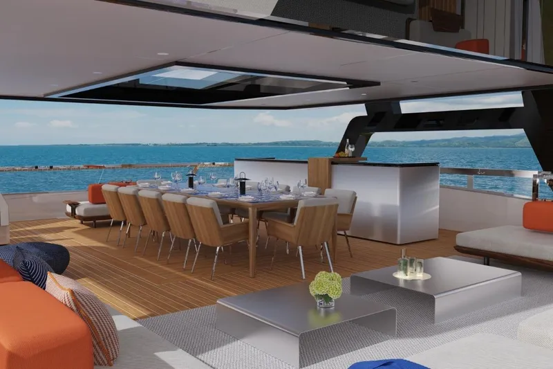  Yacht Photos Pics Luxurious 2026 Silver Yachts SC22M interior with elegant dining area and ocean view.