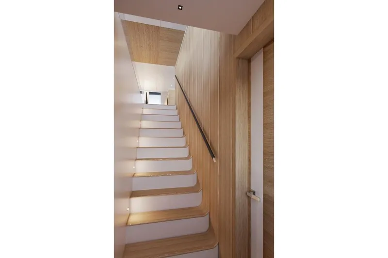  Yacht Photos Pics Modern wooden staircase inside 2026 Silver Yachts SC22M, featuring sleek design and ambient lighting.