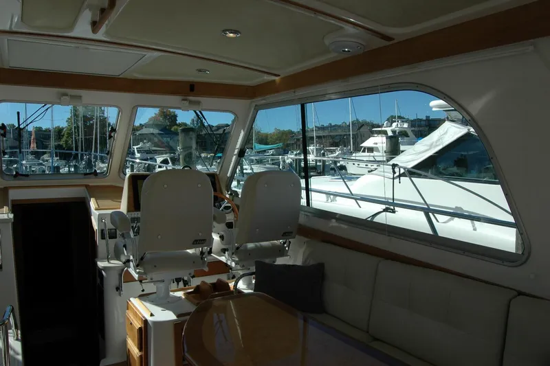 Bonnie Blue Yacht Photos Pics Interior view of 2015 Back Cove 37 yacht with marina background.