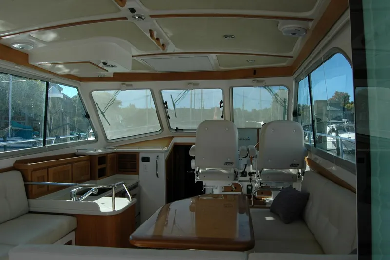 Bonnie Blue Yacht Photos Pics Interior of 2015 Back Cove 37 yacht with seating and helm station.