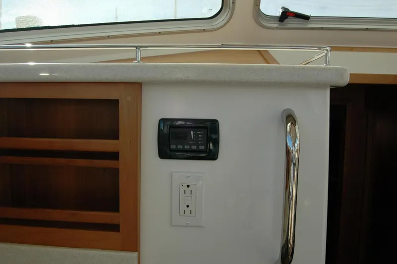 Bonnie Blue Yacht Photos Pics Interior of 2015 Back Cove 37 yacht with control panel and power outlet.