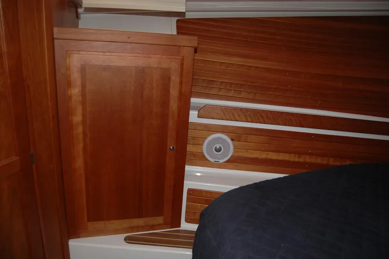 Bonnie Blue Yacht Photos Pics Interior of 2015 Back Cove 37 yacht with wooden paneling and speaker.