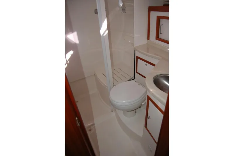Bonnie Blue Yacht Photos Pics 2015 Back Cove 37 yacht bathroom with shower, toilet, and sink.