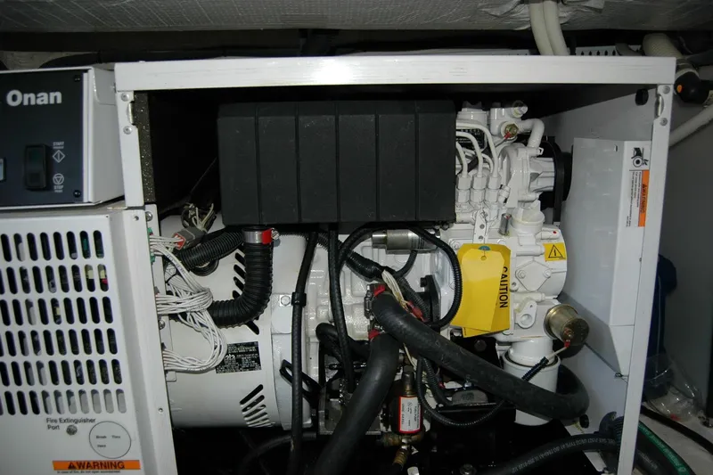 Bonnie Blue Yacht Photos Pics Engine compartment of a 2015 Back Cove 37 boat featuring an Onan generator.