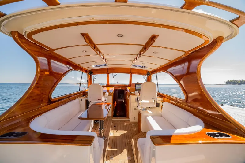 Pipe Dreams Yacht Photos Pics Luxurious 2002 Hinckley Talaria 44 Express yacht interior with elegant wood finish.