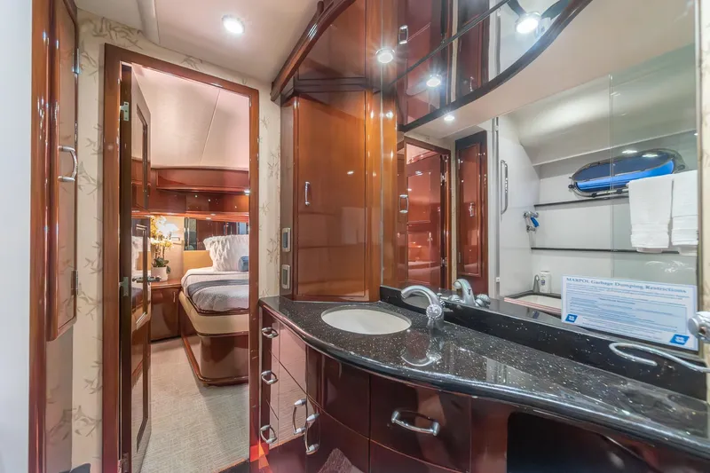 Believe Yacht Photos Pics Luxurious 2004 Marquis Motor Yacht interior with elegant wood finishes and modern amenities.