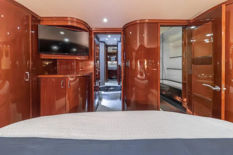 Believe Yacht Photos Pics Luxurious 2004 Marquis Motor Yacht interior with polished wood finish and modern amenities.