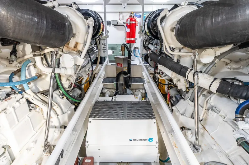 "five Seas" Yacht Photos Pics Engine room of 2007 Viking 64 Convertible yacht with Seakeeper 6 stabilizer system.