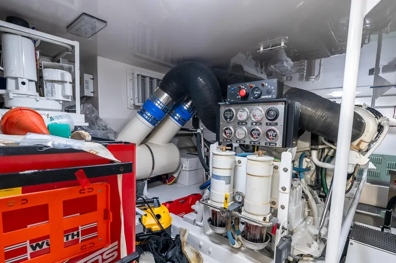 "five Seas" Yacht Photos Pics Engine room of 2007 Viking 64 Convertible yacht with gauges and equipment.