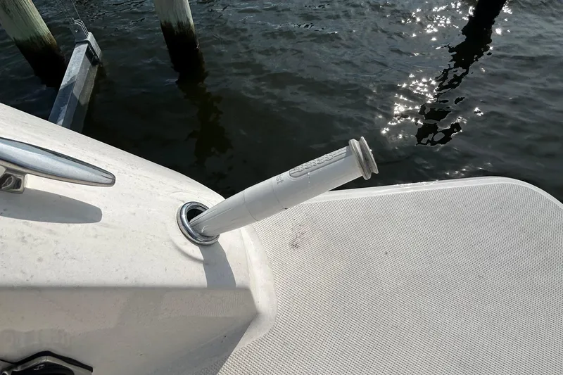  Yacht Photos Pics 2024 Regal 26 XO boat detail with water reflection and deck cleat.
