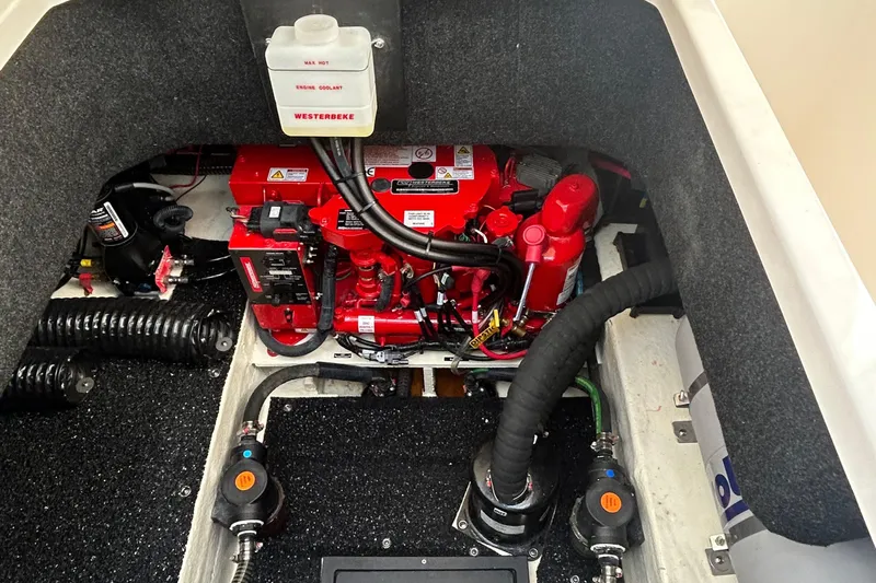  Yacht Photos Pics Engine compartment of 2024 Regal 26 XO boat with visible Westerbeke components.