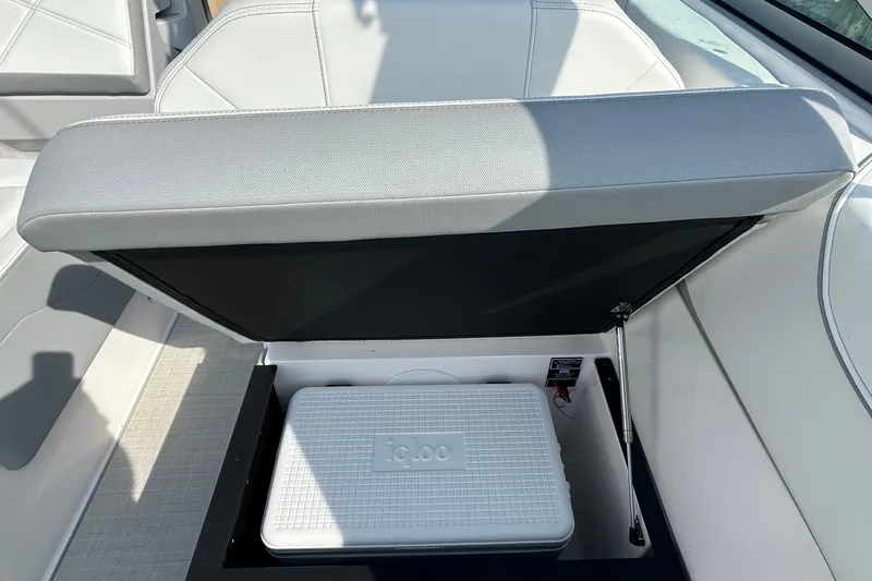  Yacht Photos Pics 2024 Regal 26 XO boat seat storage with Igloo cooler inside.