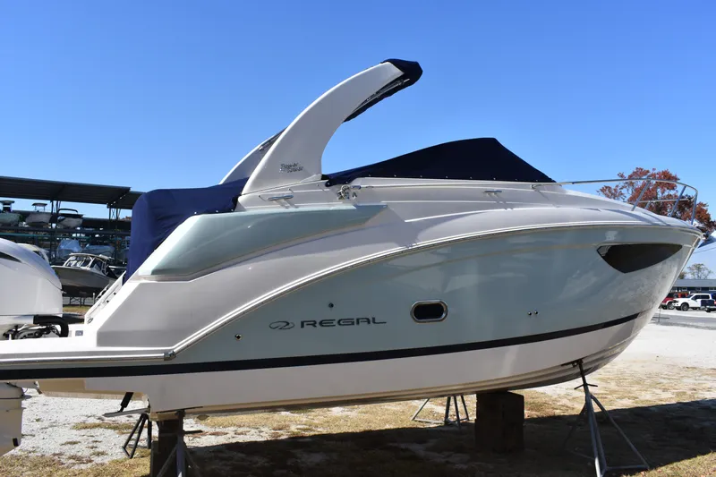  Yacht Photos Pics 2024 Regal 26 XO boat on display, featuring sleek design and modern amenities.