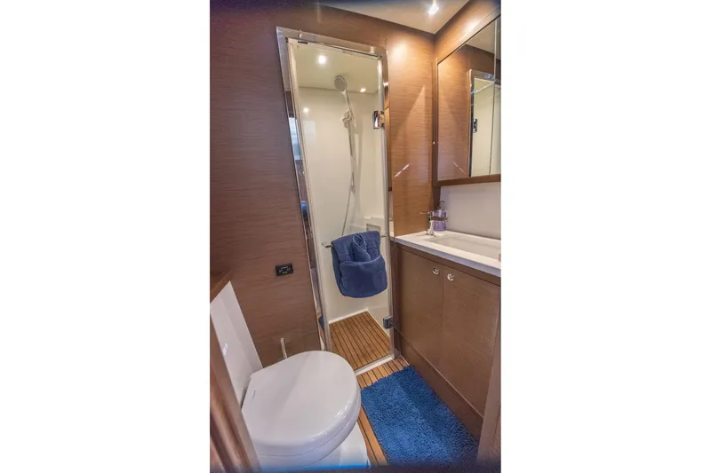 Grace Yacht Photos Pics Luxurious bathroom in 2020 Lagoon 52 F yacht with modern fixtures and wooden accents.