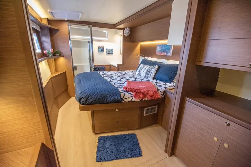 Grace Yacht Photos Pics Luxurious cabin interior of 2020 Lagoon 52 F yacht with modern furnishings.