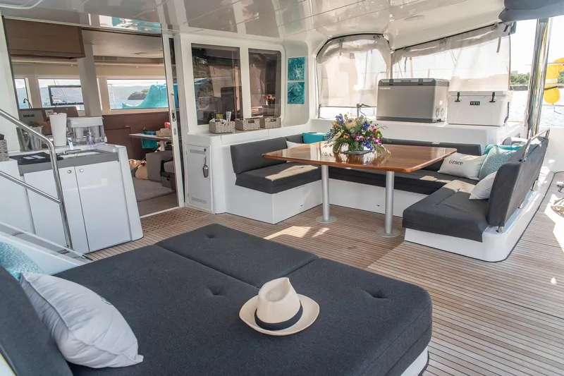 Grace Yacht Photos Pics Luxurious Lagoon 52 F 2020 yacht interior with elegant seating and dining area.