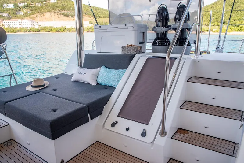 Grace Yacht Photos Pics Luxurious Lagoon 52 F yacht deck with cushions and stairs, 2020 model.