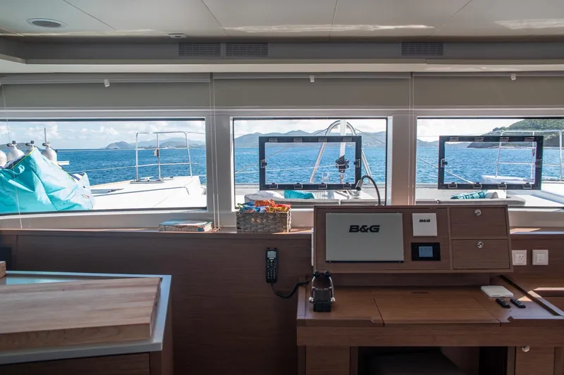 Grace Yacht Photos Pics Interior view of 2020 Lagoon 52 F yacht with ocean and island scenery.