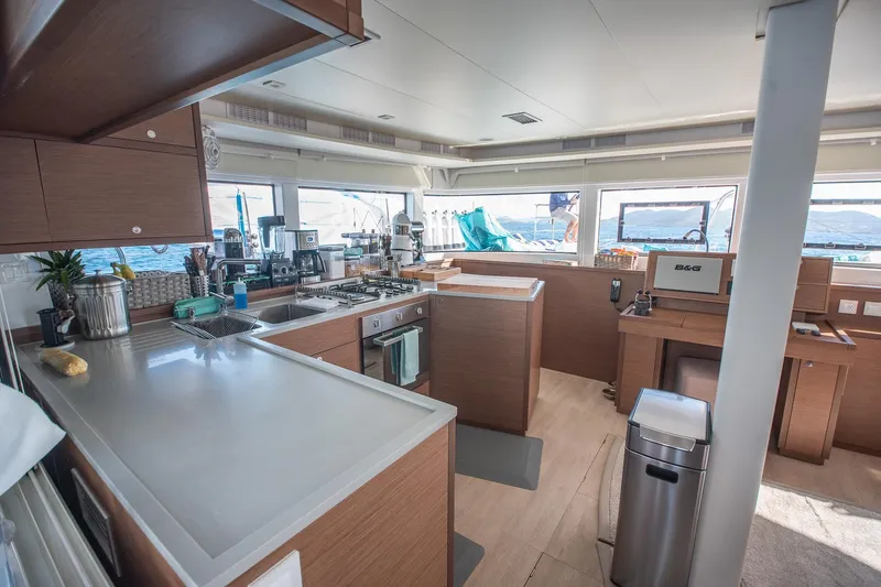Grace Yacht Photos Pics Modern kitchen interior of 2020 Lagoon 52 F yacht with ocean view.