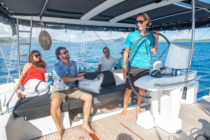 Grace Yacht Photos Pics People enjoying a sail on a 2020 Lagoon 52 F catamaran.