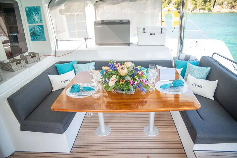 Grace Yacht Photos Pics Luxurious Lagoon 52 F yacht interior with elegant dining setup, 2020 model.
