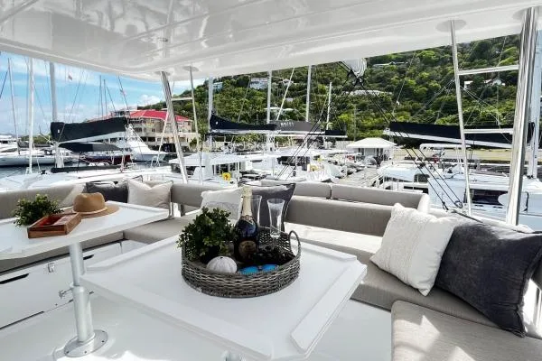 Sea Breeze Yacht Photos Pics Luxurious 2023 Bali 5.4 yacht interior with elegant seating and marina view.