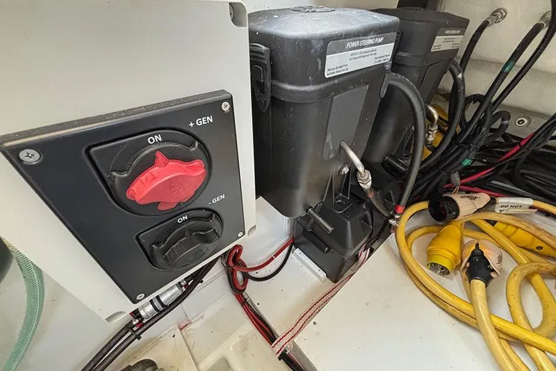  Yacht Photos Pics Electrical panel and wiring inside a 2023 Beneteau Antares 11 boat.