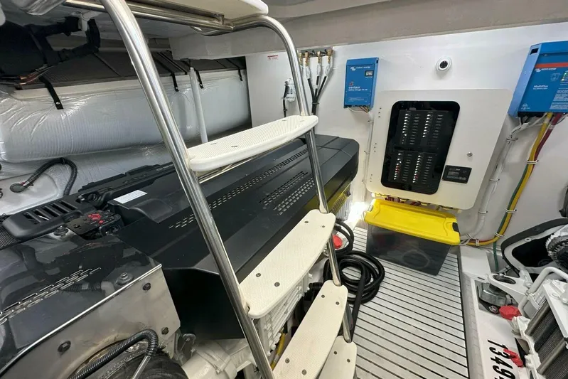 Just Fine Yacht Photos Pics Engine room of 2025 Tiara Yachts EX 60, featuring modern equipment and organized layout.