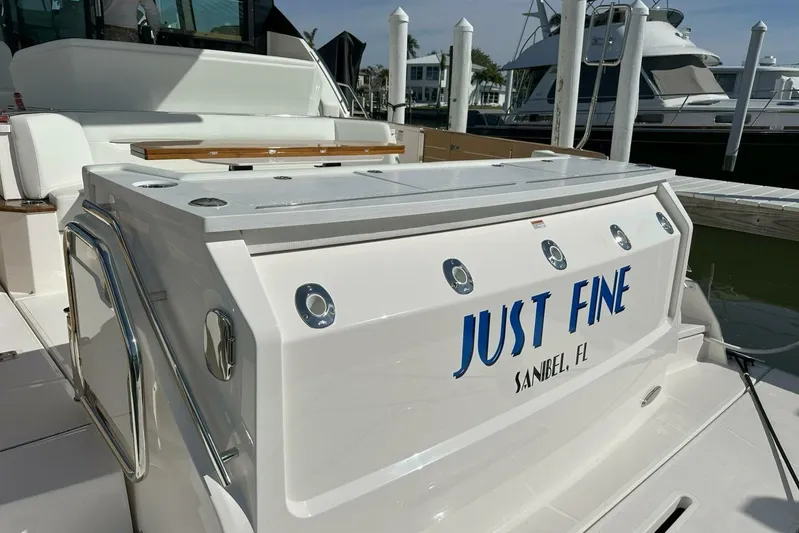 Just Fine Yacht Photos Pics 2025 Tiara Yachts EX 60 at dock, named "Just Fine," Sanibel, FL.