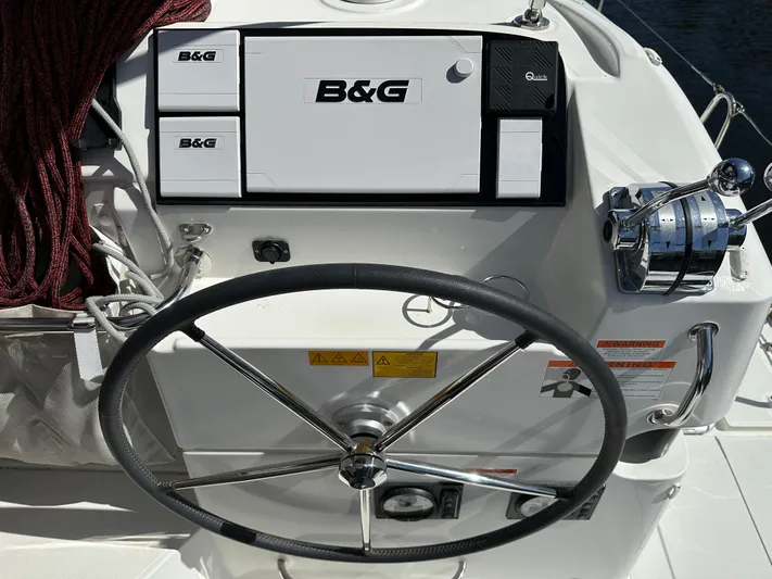  Yacht Photos Pics Steering wheel and control panel of a 2020 Lagoon 40 catamaran.