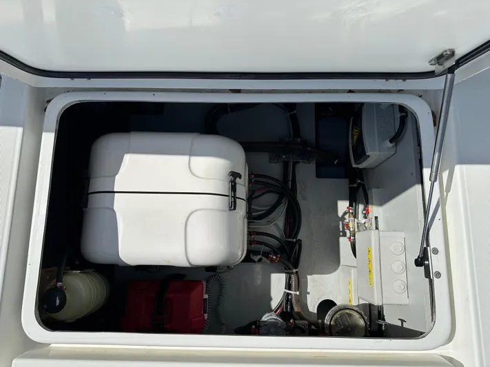  Yacht Photos Pics Engine compartment of a 2020 Lagoon 40 catamaran, showing equipment and wiring.