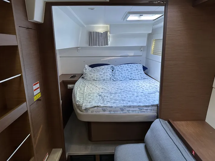  Yacht Photos Pics Interior cabin of 2020 Lagoon 40 catamaran with cozy bed and modern design.