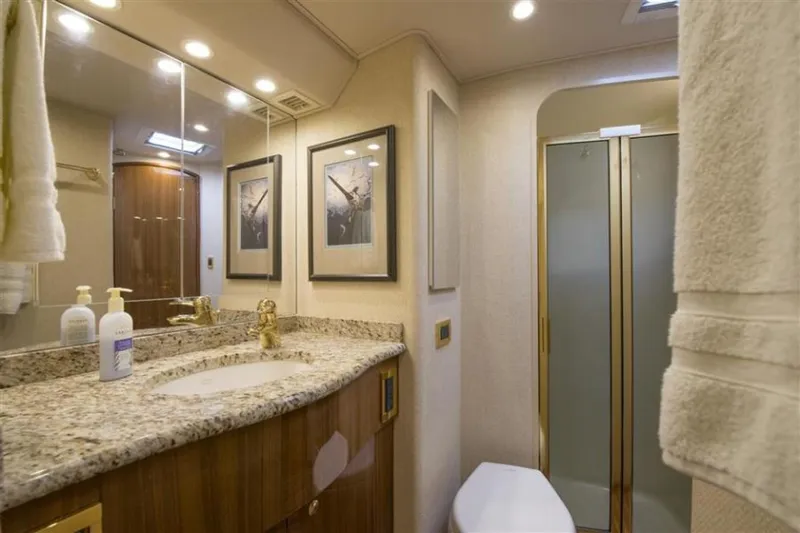 She's All Hooked Up Yacht Photos Pics Luxurious bathroom in a 2008 Viking 52 Sport Coupe yacht with granite countertop.