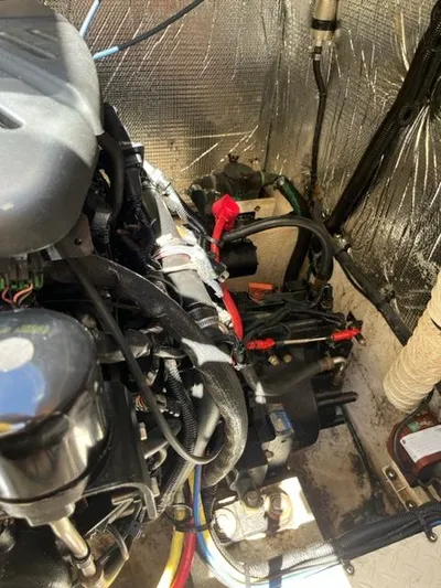 True Blue Yacht Photos Pics Engine compartment of a 2003 Cruisers Yachts 3772 Express boat.