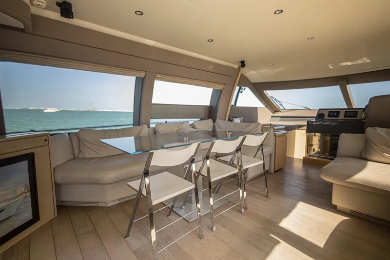 Navegante Yacht Photos Pics Luxurious interior of 2013 Ferretti Yachts 690 with elegant seating and ocean view.