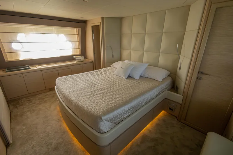 Navegante Yacht Photos Pics Luxurious bedroom interior of 2013 Ferretti Yachts 690 with elegant lighting and modern design.