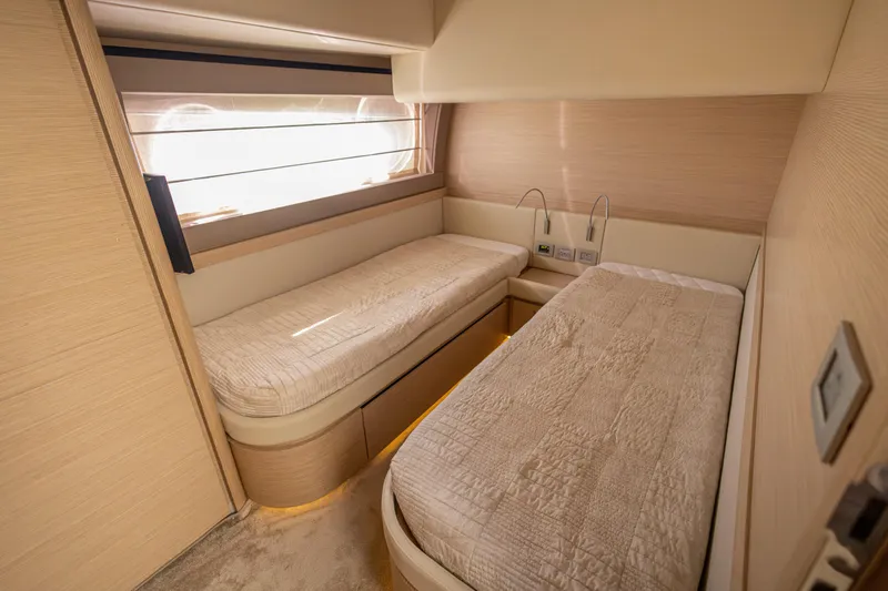 Navegante Yacht Photos Pics Luxurious twin cabin interior of 2013 Ferretti Yachts 690 with modern design.